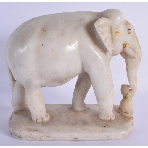 1519 - A 19TH CENTURY INDIAN RAJASTHAN CARVED MARBLE FIGURE OF AN ELEPHANT modelled roaming. 21 cm x 21 cm.