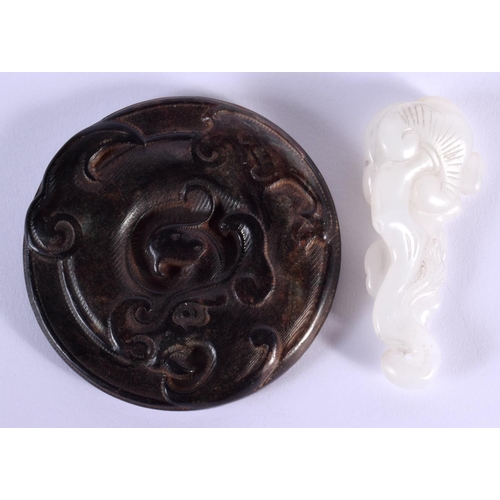 1524 - A CHINESE CARVED WHITE JADE LINGZHI FUNGUS together with a black jade dragon roundel. Largest 7.5 cm... 