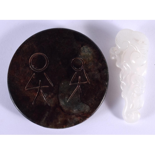 1524 - A CHINESE CARVED WHITE JADE LINGZHI FUNGUS together with a black jade dragon roundel. Largest 7.5 cm... 