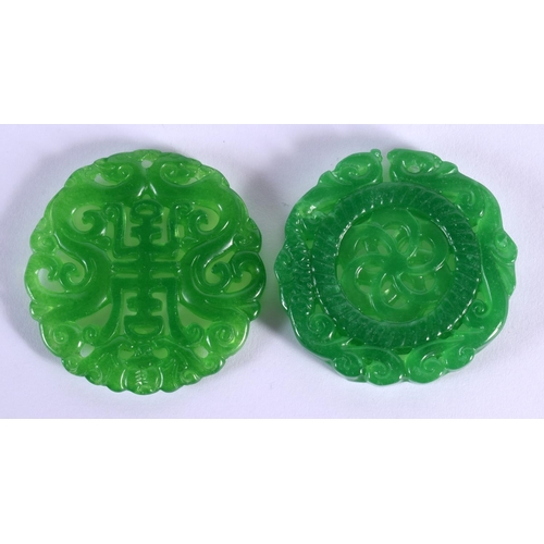 1526 - A CHINESE CARVED GREEN JADE PLAQUE 20th Century, together with another. 5 cm wide. (2)