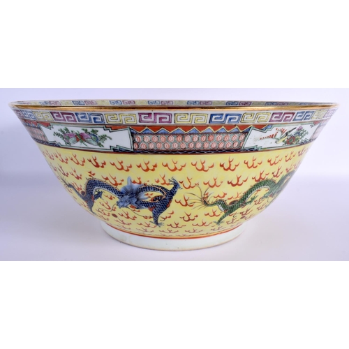 1537 - A LARGE EARLY 20TH CENTURY CHINESE FAMILLE JAUNE PORCELAIN BOWL Guangxu. 38 cm diameter.