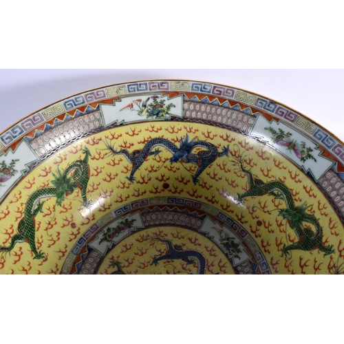 1537 - A LARGE EARLY 20TH CENTURY CHINESE FAMILLE JAUNE PORCELAIN BOWL Guangxu. 38 cm diameter.