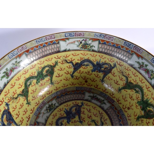 1537 - A LARGE EARLY 20TH CENTURY CHINESE FAMILLE JAUNE PORCELAIN BOWL Guangxu. 38 cm diameter.