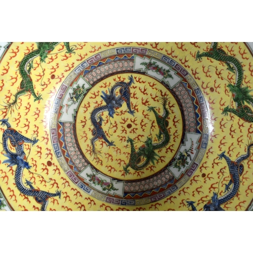 1537 - A LARGE EARLY 20TH CENTURY CHINESE FAMILLE JAUNE PORCELAIN BOWL Guangxu. 38 cm diameter.