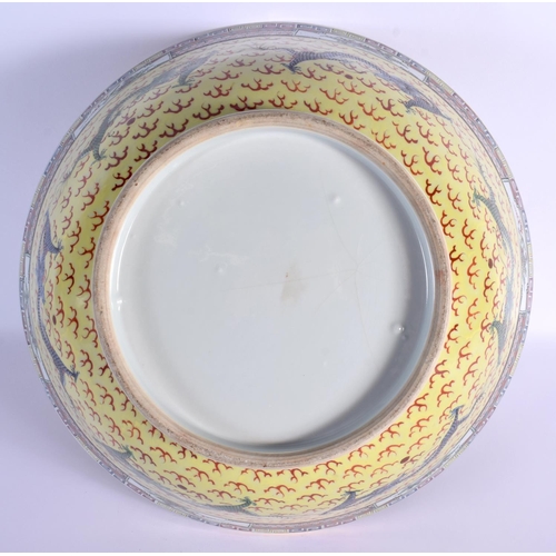 1537 - A LARGE EARLY 20TH CENTURY CHINESE FAMILLE JAUNE PORCELAIN BOWL Guangxu. 38 cm diameter.