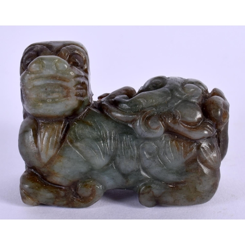 1546 - A LATE 19TH CENTURY CHINESE CARVED JADE FIGURE OF A BEAST modelled holding a fungus. 5 cm x 4 cm.