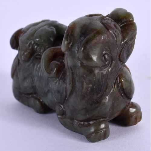 1546 - A LATE 19TH CENTURY CHINESE CARVED JADE FIGURE OF A BEAST modelled holding a fungus. 5 cm x 4 cm.