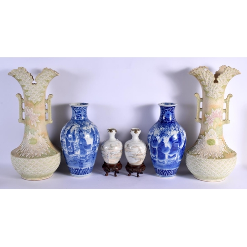 1557 - THREE PAIRS OF 19TH CENTURY JAPANESE MEIJI PERIOD PORCELAIN VASES. Largest 50 cm x 15 cm. (6)