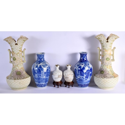 1557 - THREE PAIRS OF 19TH CENTURY JAPANESE MEIJI PERIOD PORCELAIN VASES. Largest 50 cm x 15 cm. (6)