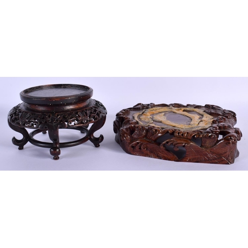 1560 - AN EARLY 20TH CENTURY CHINESE CARVED HARDWOOD STAND Late Qing/Republic, together with another wavy s... 