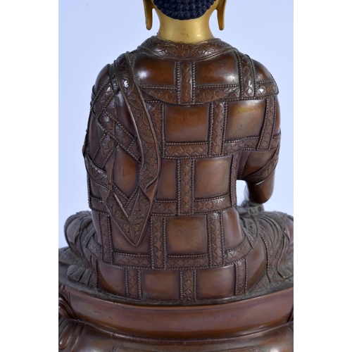 1564 - A RARE EARLY 20TH CENTURY CHINESE SINO TIBETAN BRONZE FIGURE OF A BUDDHA inscribed with scripture. 2... 