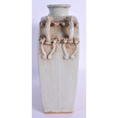 1565 - A CHINESE MONOCHROME CELADON TYPE TWIN HANDLED VASE moulded with birds and foliage. 23 cm x 16 cm.