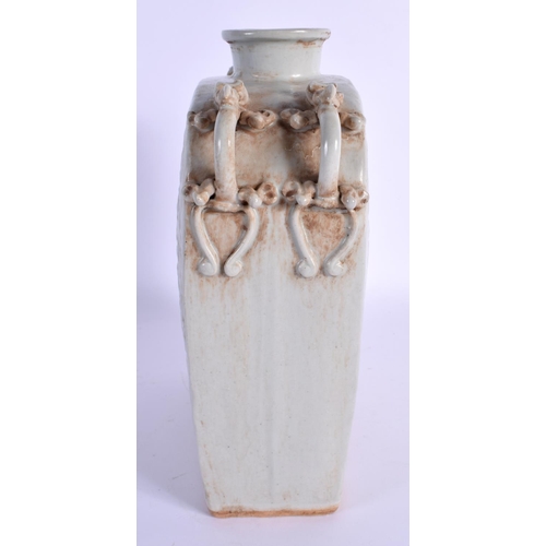 1565 - A CHINESE MONOCHROME CELADON TYPE TWIN HANDLED VASE moulded with birds and foliage. 23 cm x 16 cm.