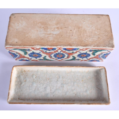 1567 - A RARE TURKISH OTTOMAN FAIENCE GLAZED DOCUMENT BOX AND COVER painted with flowers. 28 cm x 12 cm.