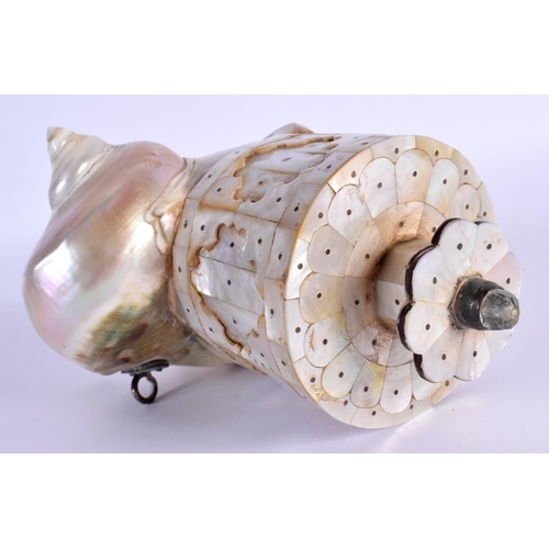 1568 - AN INDIAN GOA CARVED MOTHER OF PEARL POWDER FLASK in the form of a cornucopia shell. 18 cm x 11 cm.