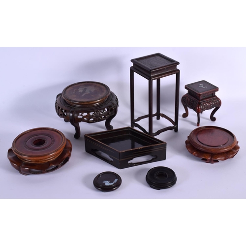 1572 - A COLLECTION OF CHINESE AND JAPANESE STANDS in various forms and sizes. (qty)