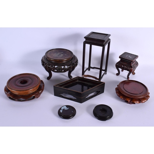 1572 - A COLLECTION OF CHINESE AND JAPANESE STANDS in various forms and sizes. (qty)