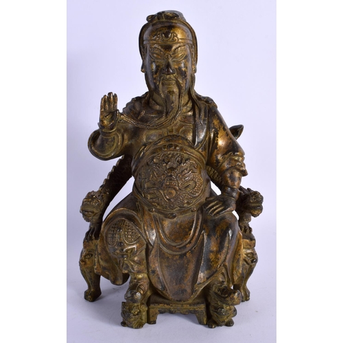 1575 - A CHINESE BRONZE FIGURE OF A SEATED GUARDIAN 20th Century. 23 cm x 11 cm.