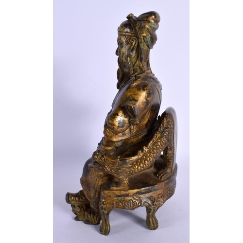 1575 - A CHINESE BRONZE FIGURE OF A SEATED GUARDIAN 20th Century. 23 cm x 11 cm.