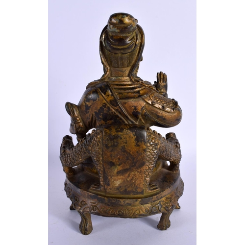 1575 - A CHINESE BRONZE FIGURE OF A SEATED GUARDIAN 20th Century. 23 cm x 11 cm.