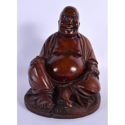 1585 - A 19TH CENTURY CHINESE CARVED ROOTWOOD FIGURE OF A BUDDHA modelled in robes. 24 cm x 12 cm.