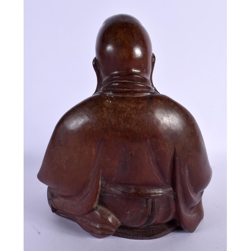 1585 - A 19TH CENTURY CHINESE CARVED ROOTWOOD FIGURE OF A BUDDHA modelled in robes. 24 cm x 12 cm.