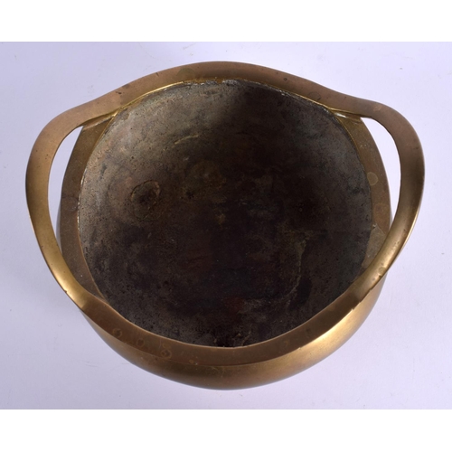 1587 - A 19TH CENTURY CHINESE TWIN HANDLED BRONZE CENSER bearing Xuande marks to base. 14 cm wide, internal... 