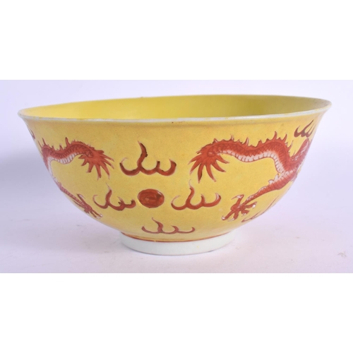 1591 - AN EARLY 20TH CENTURY CHINESE YELLOW GROUND IRON RED DRAGON BOWL Guangxu. 13 cm diameter.