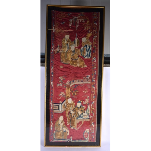 1597 - A LARGE LATE 19TH CENTURY CHINESE RED SILKWORK PANEL Late Qing, depicting figures. 115 cm x 40 cm.