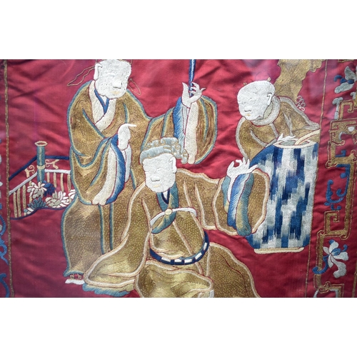 1597 - A LARGE LATE 19TH CENTURY CHINESE RED SILKWORK PANEL Late Qing, depicting figures. 115 cm x 40 cm.