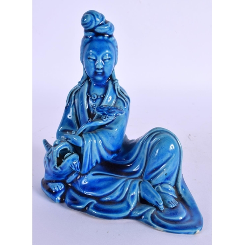 1599 - A 19TH CENTURY CHINESE BLUE GLAZED FIGURE OF AN IMMORTAL Late Qing. 15 cm x 10 cm.