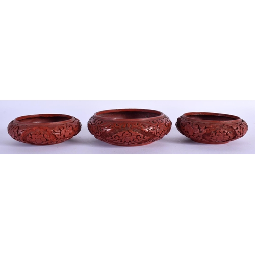 1603 - THREE EARLY 20TH CENTURY CHINESE CINNABAR LACQUER BOWLS Late Qing/Republic. Largest 9.5 cm diameter.... 