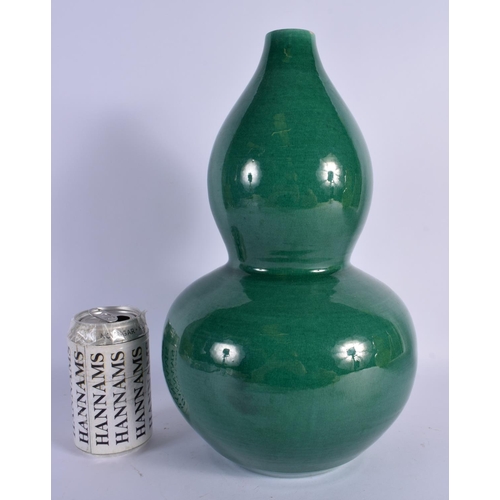 1617 - A CHINESE GREEN GLAZED DOUBLE GOURD VASE 20th Century. 34 cm high.