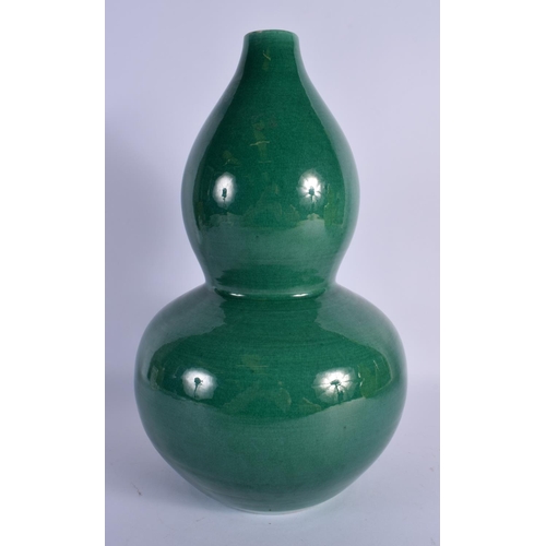 1617 - A CHINESE GREEN GLAZED DOUBLE GOURD VASE 20th Century. 34 cm high.