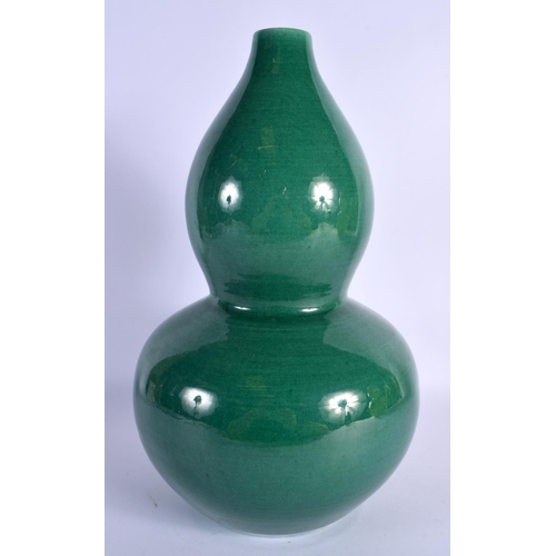 1617 - A CHINESE GREEN GLAZED DOUBLE GOURD VASE 20th Century. 34 cm high.