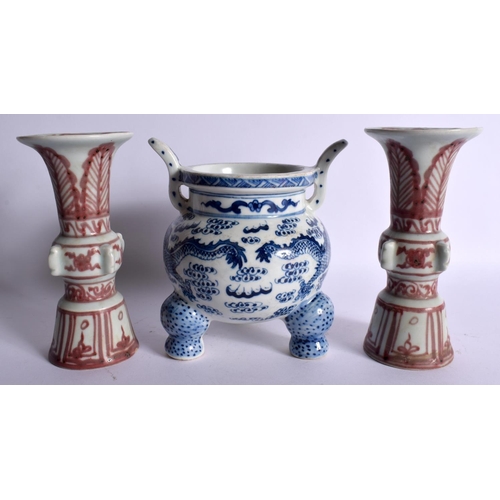 1625 - A CHINESE TWIN HANDLED BLUE AND WHITE CENSER together with a pair of vases. Largest 15 cm high. (3)