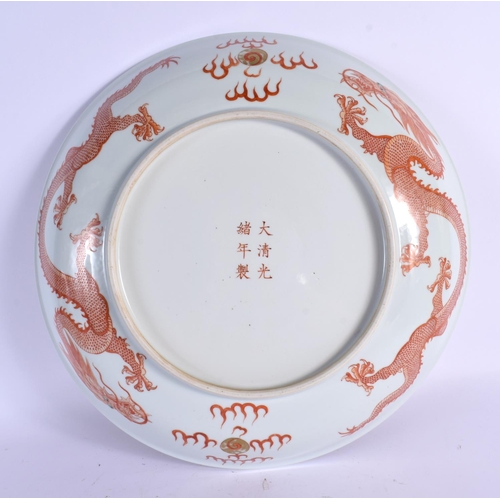 1641 - A LARGE CHINESE PORCELAIN IRON RED DRAGON DISH Guangxu mark and probably of the period. 30 cm diamet... 