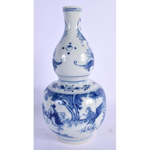 1644 - A 19TH CENTURY CHINESE BLUE AND WHITE DOUBLE GOURD VASE painted with figures in landscapes. 25 cm hi... 