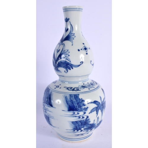 1644 - A 19TH CENTURY CHINESE BLUE AND WHITE DOUBLE GOURD VASE painted with figures in landscapes. 25 cm hi... 