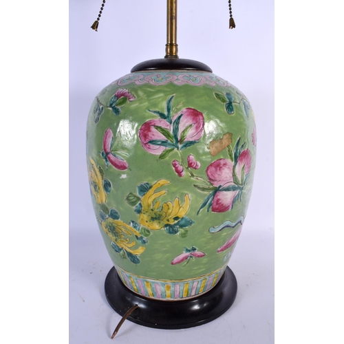 1665 - A LARGE EARLY 20TH CENTURY CHINESE FAMILLE ROSE GREEN GLAZED VASE converted to a lamp. 55 cm high.