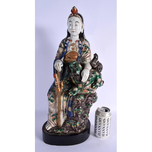 1666 - A LARGE 19TH CENTURY JAPANESE MEIJI PERIOD AO KUTANI PORCELAIN FIGURE modelled with a buddhistic lio... 