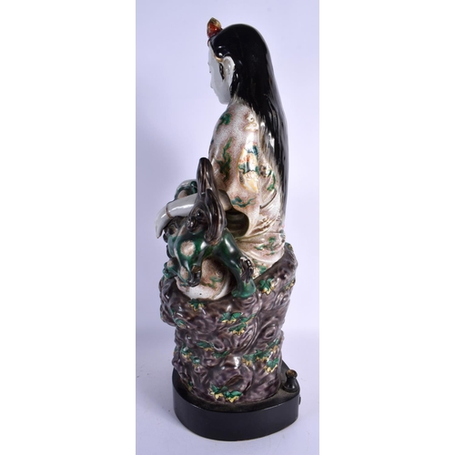 1666 - A LARGE 19TH CENTURY JAPANESE MEIJI PERIOD AO KUTANI PORCELAIN FIGURE modelled with a buddhistic lio... 