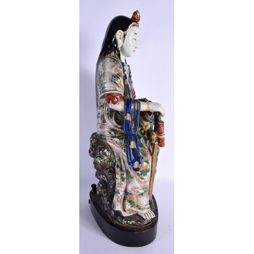 1666 - A LARGE 19TH CENTURY JAPANESE MEIJI PERIOD AO KUTANI PORCELAIN FIGURE modelled with a buddhistic lio... 