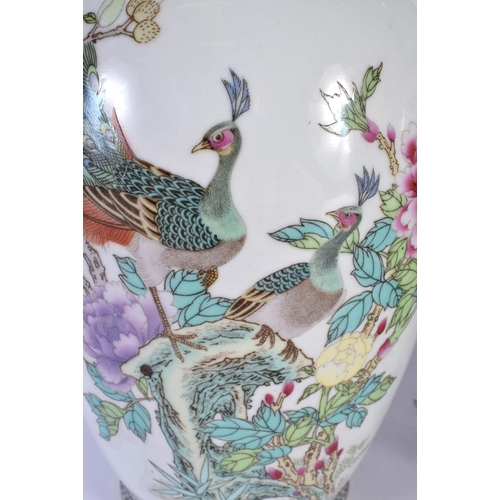 1667 - A LARGE PAIR OF CHINESE REPUBLICAN PERIOD FAMILLE ROSE VASES painted with birds and flowers. 37 cm h... 