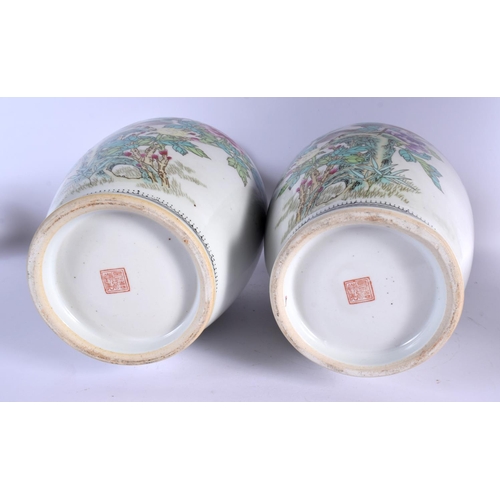 1667 - A LARGE PAIR OF CHINESE REPUBLICAN PERIOD FAMILLE ROSE VASES painted with birds and flowers. 37 cm h... 