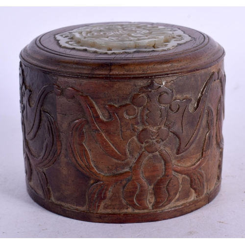 1672 - A RARE 19TH CENTURY CHINESE HARDWOOD AND JADE COVER Qing, decorated with bats. 7 cm x 6 cm.