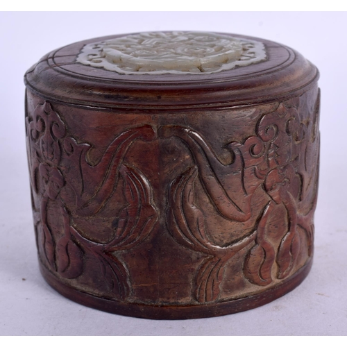 1672 - A RARE 19TH CENTURY CHINESE HARDWOOD AND JADE COVER Qing, decorated with bats. 7 cm x 6 cm.