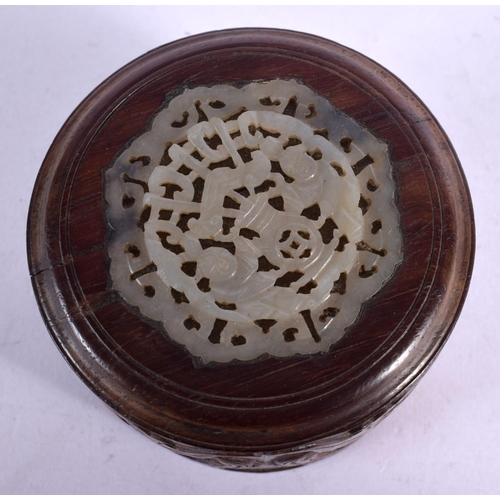 1672 - A RARE 19TH CENTURY CHINESE HARDWOOD AND JADE COVER Qing, decorated with bats. 7 cm x 6 cm.