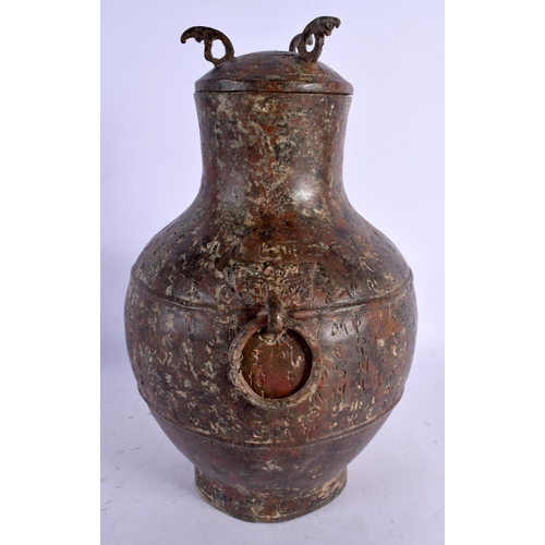 1689 - A CHINESE ARCHAIC BRONZE VASE AND COVER 20th Century. 29 cm high.