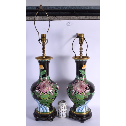 1694 - A PAIR OF EARLY 20TH CENTURY CHINESE CLOISONNE ENAMEL VASES converted to lamps. 56 cm high overall.